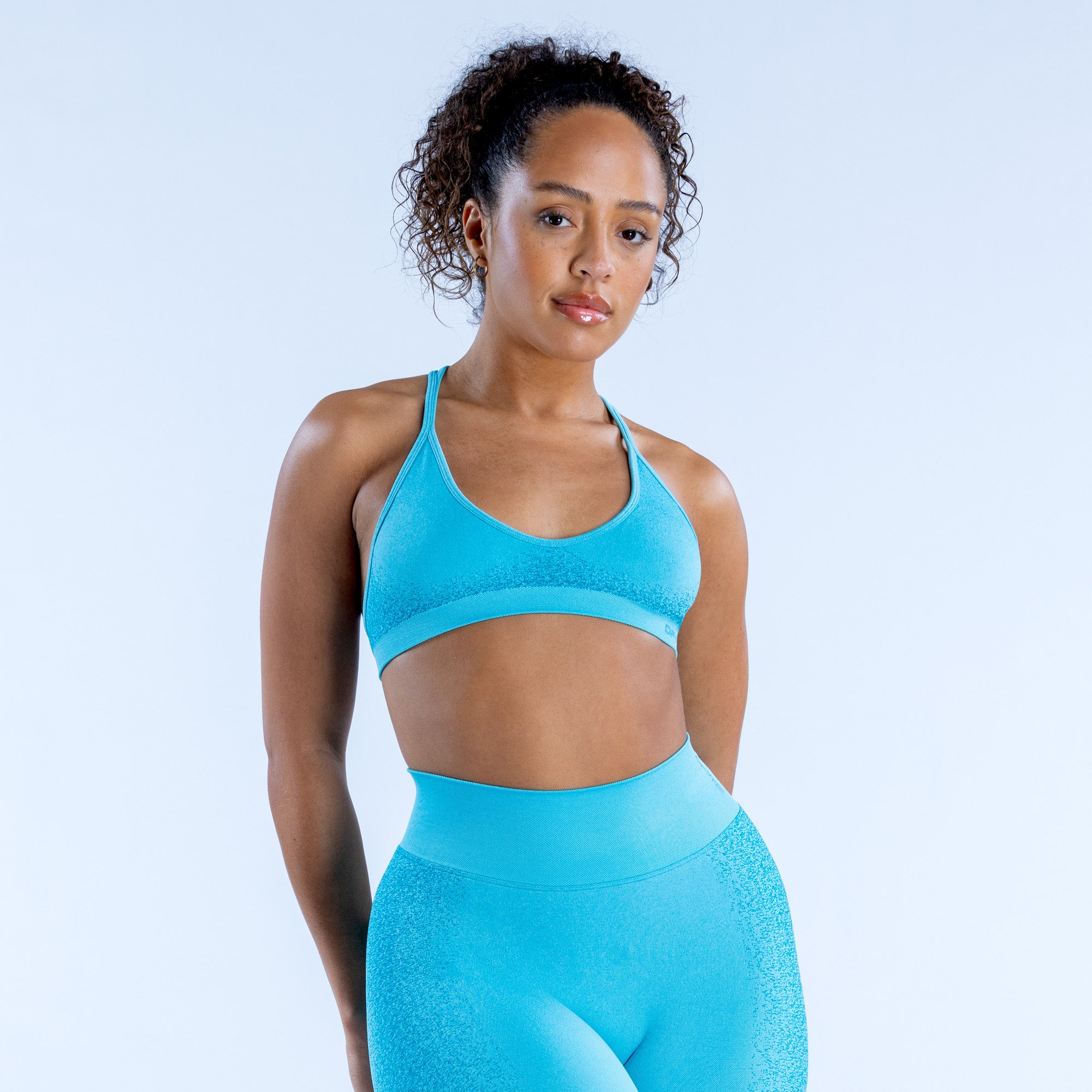DFYNE Ignite Cross Back Sports BH Dame Lyseturkis | EQ9342805